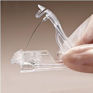 Huber Needle Removal and Containment Device